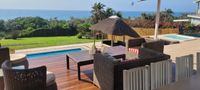 oceanview pool-deck with spa and relaxchairs